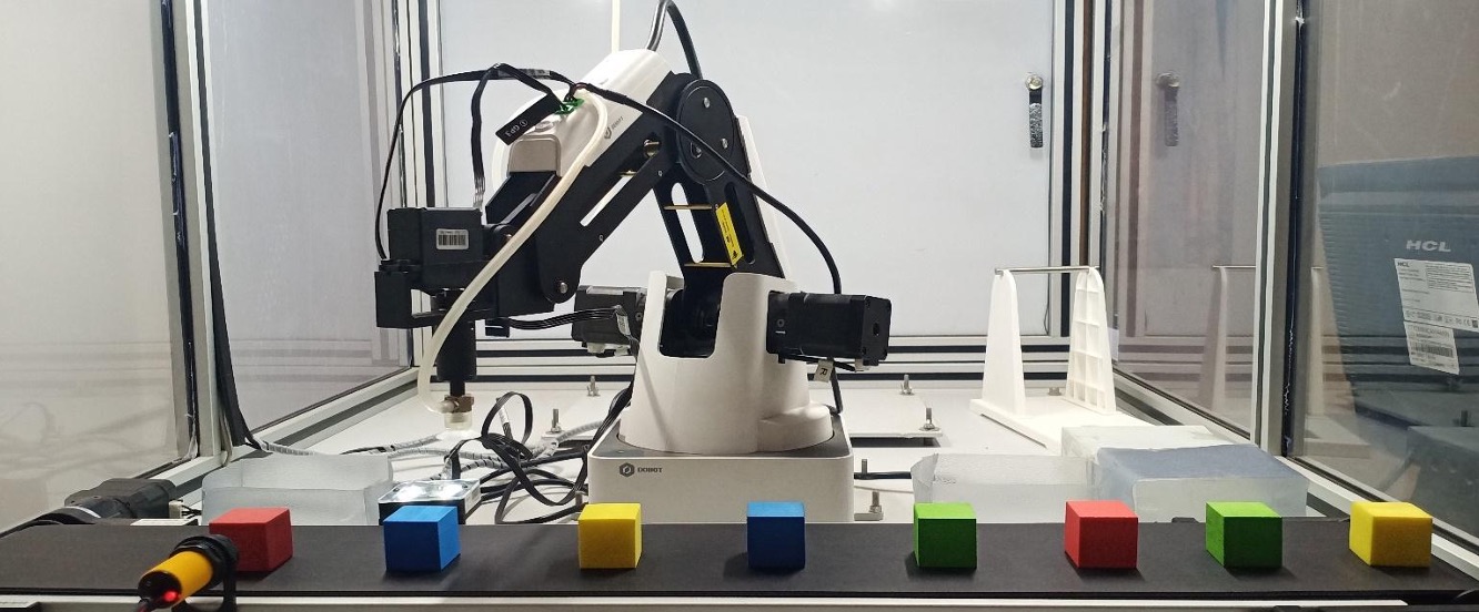 Robotic arm arranged for automated sorting and stacking.