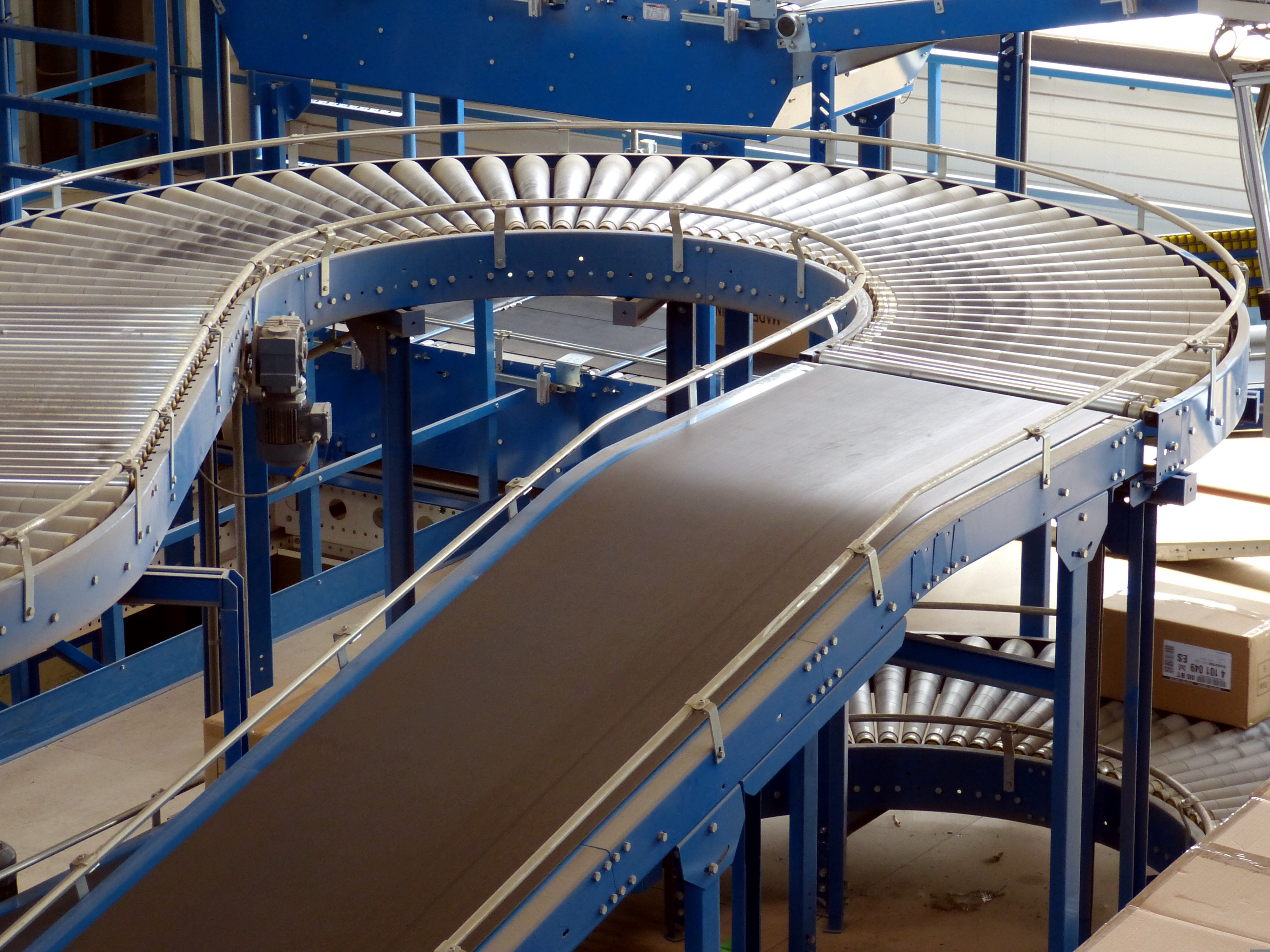Industrial conveyor system inside a factory.